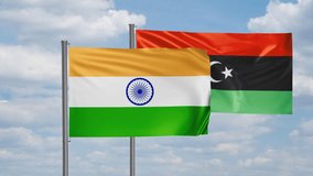 Libya and India flag waving together in the wind on blue sky, cycle looped video, two country cooperation concept
