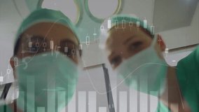 Animation of data processing over smiling caucasian female surgeons removing masks in theatre. Medical services, technology, data and healthcare concept digitally generated video