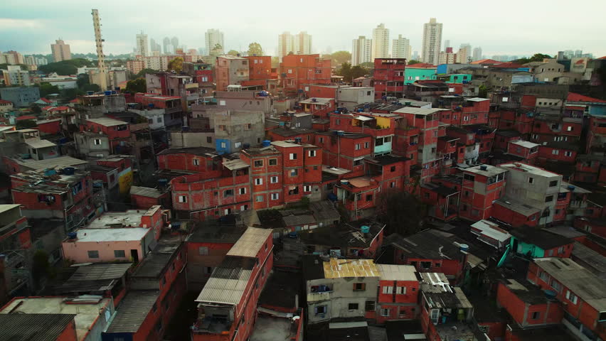 Drone shot around the Villa lobos shantytown, sunny evening in Sao Paulo, Brazil
