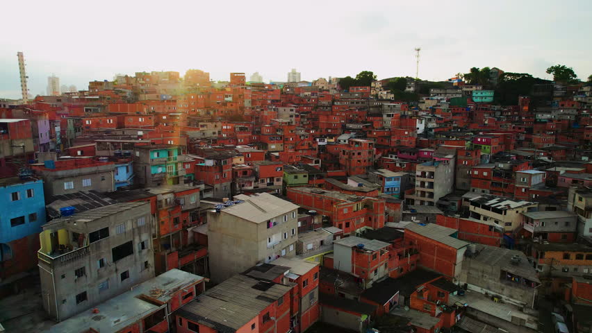 Aerial view over vibrant slum homes, sunny evening in Vila lobos, Sao Paulo Royalty-Free Stock Footage #1105600185