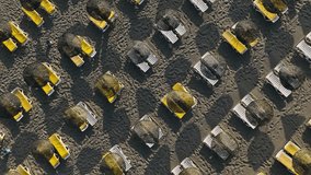 Secluded Beach Bliss: Aerial View of Deserted Beach Loungers on the Mediterranean Shoreline