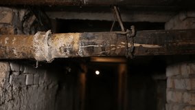 Old sewer cast iron rusty pipes in the basement. - Powered by Shutterstock - Get 15% off with code: PIKWIZARD15