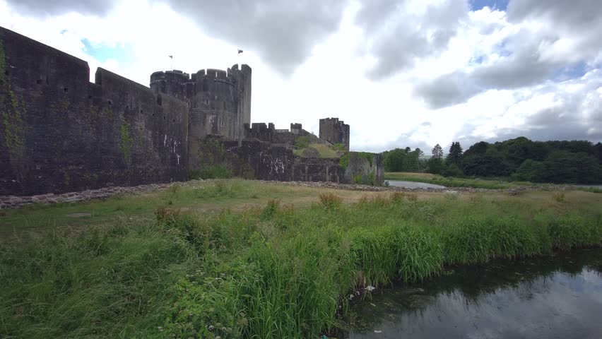 Caerphilly Castle, a partially ruined fortification, dating from the 13th Century. Caerphilly Mid-Glamorgan South Wales, United Kingdom - 25th of June 2023