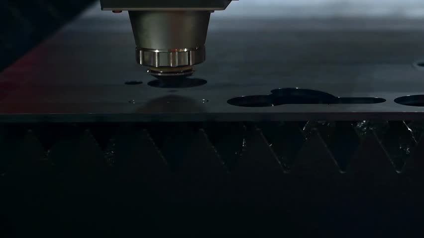  Laser cut head machine while cutting the sheet metal with the sparking light in factory Royalty-Free Stock Footage #1105638119