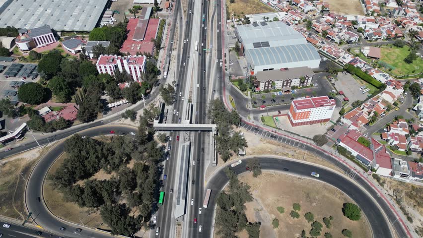Zooming Out: Aerial View of Vallarta Avenue and Periferico Overpass in Guadalajara