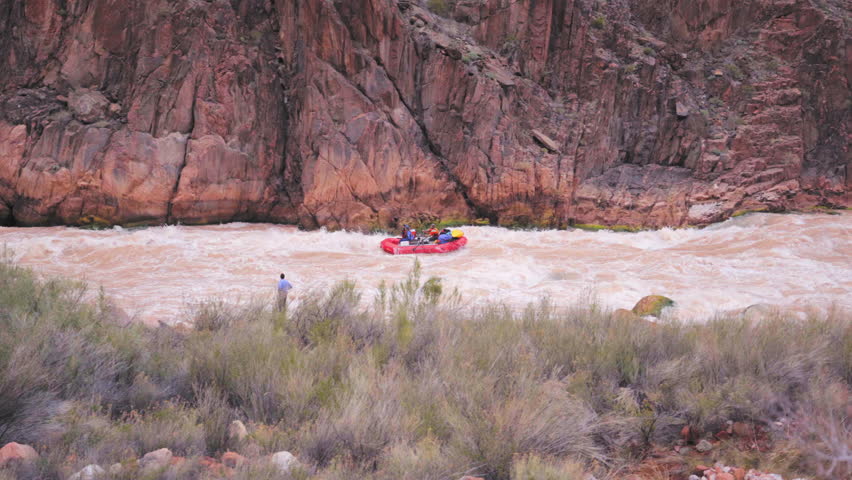 Tourists Whiteriver Rafting At The Grand Canyon Granite Rapid In Arizona, USA. Tracking Shot
