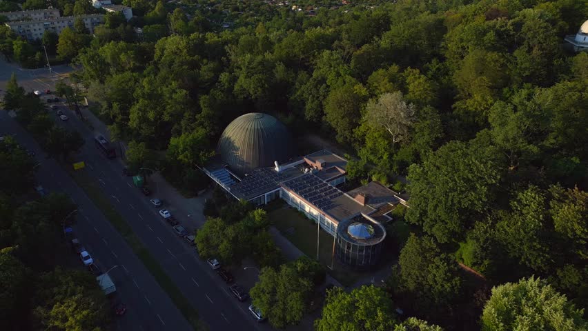 Smooth aerial top view flight Berlin city Planetarium Germany in Europe, summer day 2023. fly reverse drone
4K cinematic.