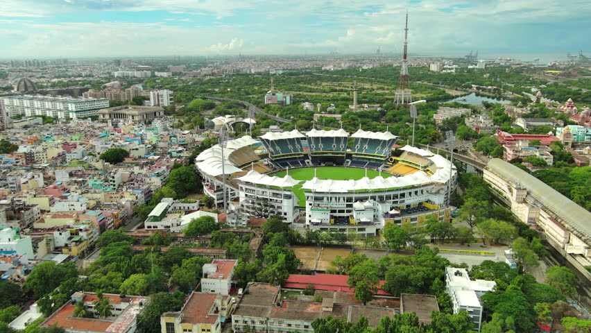 CHENNAI, INDIA - 20.5.2021: Aerial view of city, M. A. Chidambaram Stadium, country's third oldest cricket stadium, home to Tamil Nadu cricket team one of main stadiums for Cricket World Cup 2023 Royalty-Free Stock Footage #1105655489