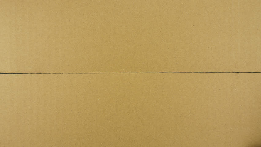 Carton box opening with chromakey inside. Unpacking cardboard, view from top Royalty-Free Stock Footage #1105657071