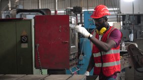 african american Mechanical engineer working  and maintenance machine in factory industries  . black worker man control machine repair and inspect in warehouse Workshop - Powered by Shutterstock - Get 15% off with code: PIKWIZARD15