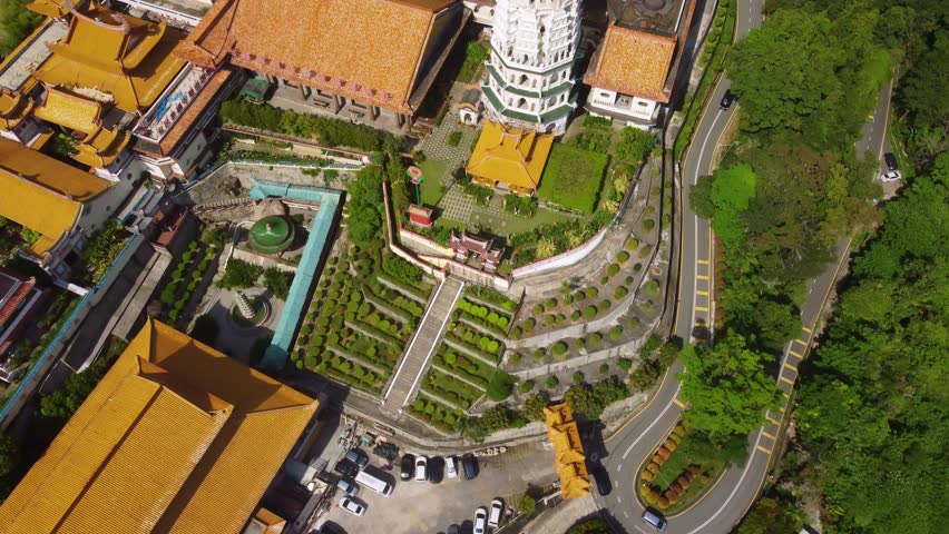 Penang, Malaysia: Aerial drone footage of the famous Kek Lok Si Buddhism temple, from the Chinese tradition, in the island of Penang in Malaysia in Southeast Asia. Shot with a tilt up motion. 