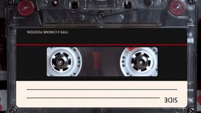 audio cassette plays in tape deck