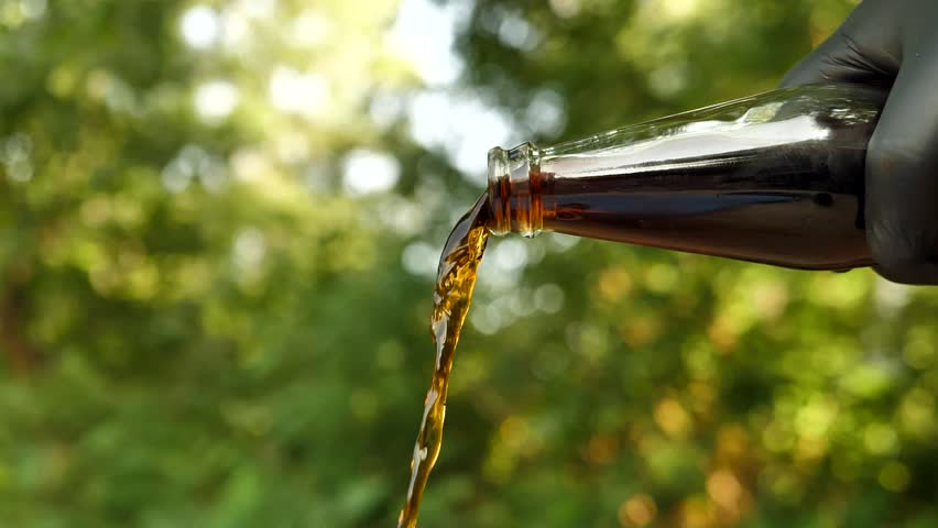 Pouring cola.Soda close-up. The camera is moving. slow motion video