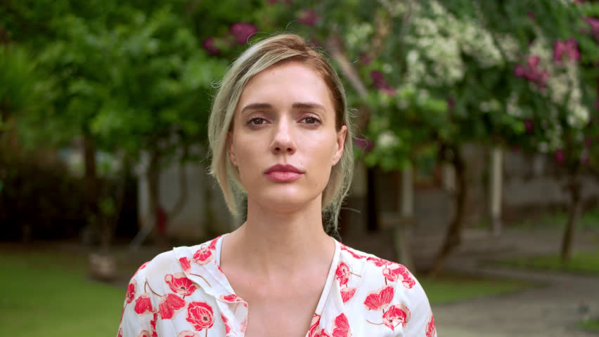 Beautiful 30s woman portrait. Pretty american girl look camera. White teeth smile close up. Cute joy blond person head shot. One nice lady walk park. Happy female face portraits. Young adult 20s model