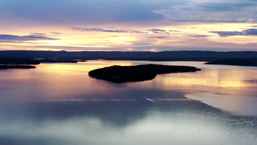Dangar island on Lake Macquarie Australian Pacific coast in aerial sunset 4k.
 Royalty-Free Stock Footage #1105752751