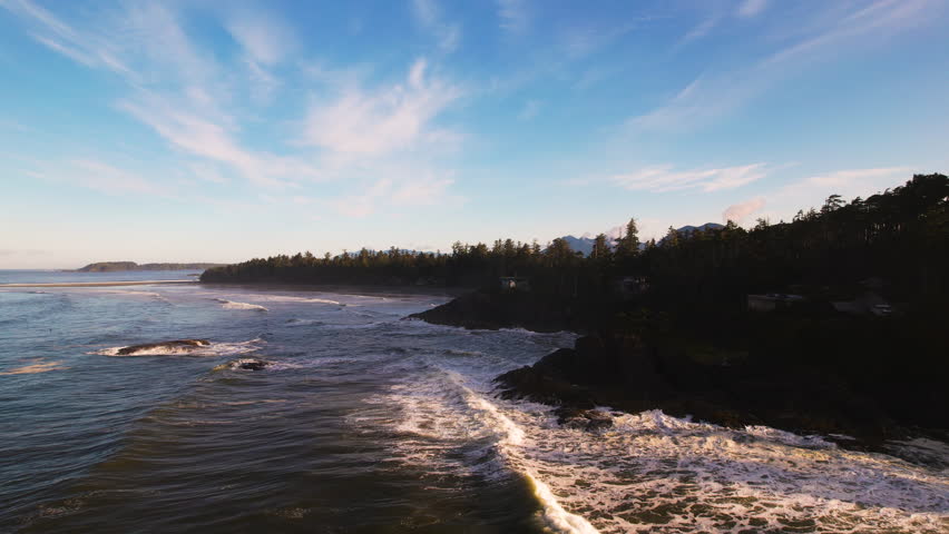 Pullback Over Long Beach Of Tofino Secluded On The West Coast Of Vancouver Island In British Columbia, Canada. Aerial Drone Shot