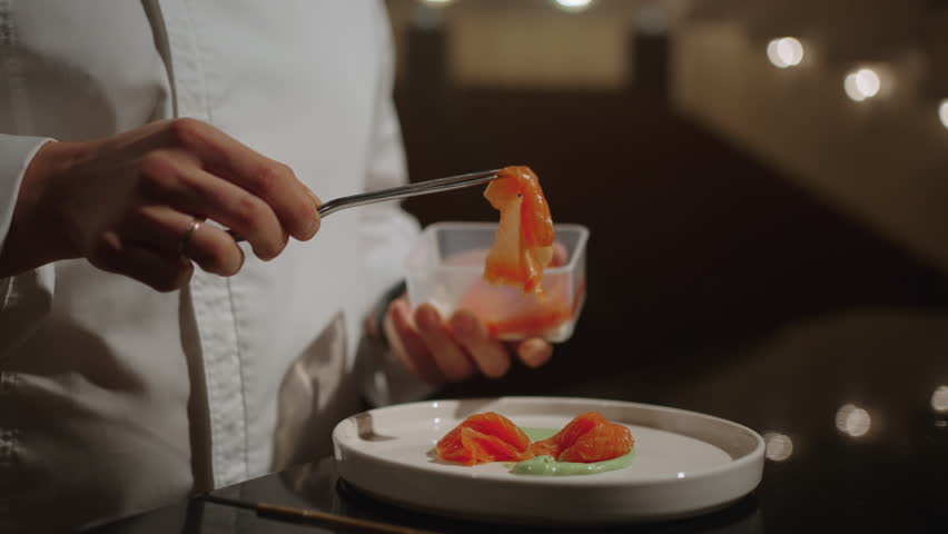 Chef Cooking Delicatessen Meal With Salmon On Stage Of Opera House, Closeup View Of Plate And Hands | Shutterstock HD Video #1105761603