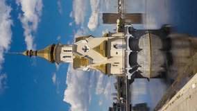 Time-lapse video of clouds passing over the Dnieper River and the Church of St. Nicholas on the Water in Kiev. Vertical UHD video