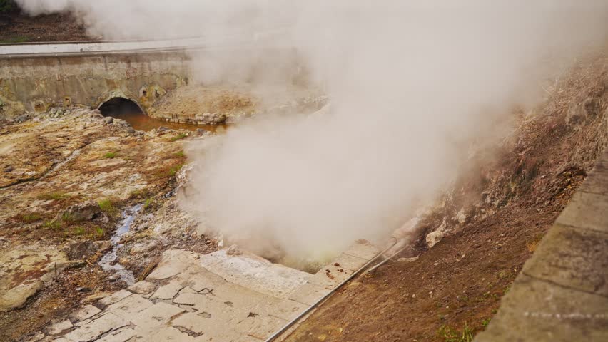 Steam Emerging from the Earth. A Captivating Tourist Attraction on a Volcanically Active Island Azores, Portugal.
