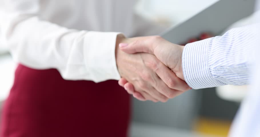 Businesswoman giving her hand to partner for handshake 4k movie