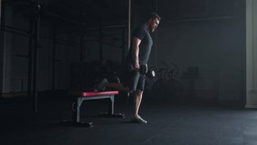 Intensive Functional Training In Gym, Man With Dumbbells In Hands Doing Squats On One Leg - Powered by Shutterstock - Get 15% off with code: PIKWIZARD15