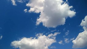 Puffy fluffy white clouds. Blue sky white clouds. Summer blue sky time lapse. Cumulus cloud cloudscape timelapse. Nature weather blue sky. White clouds background. Cloud time lapse.