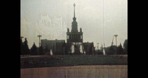Vdnh area in city view, wide footage. Retro 1980s Moscow Russia. No people in street. Travel to architecture building. Tourism to famous square landmark. Archival vintage color film. Old archive video