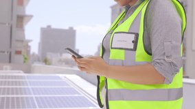Phone, woman and hands of solar engineer on roof, typing or social media on break outdoor. Smartphone, contractor and person texting, communication or networking in city for renewable energy research - Powered by Shutterstock - Get 15% off with code: PIKWIZARD15