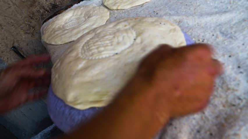 The stage of making Uzbek flatbread Royalty-Free Stock Footage #1105786841