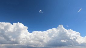 above ozone view time-lapse clouds and blue sunny sky, Loop of fluffy white clouds over blue sky. sun Rays,  drone shooting clouds motion time, natural blue sky a white cumulus cloudy weather. 4K.