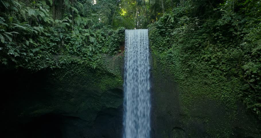 Beautiful Tibumana Waterfall on nature background. Bali, Indonesia  Royalty-Free Stock Footage #1105797801
