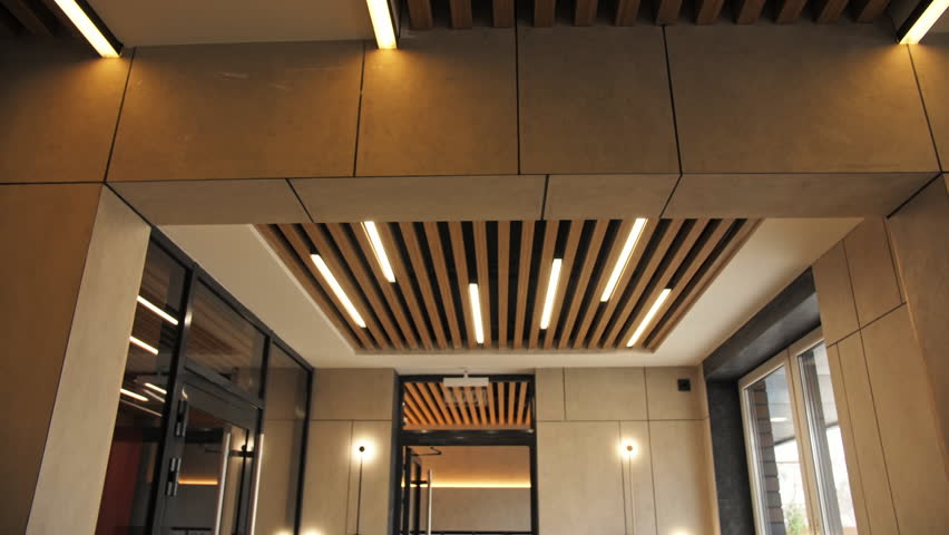 Decorative timber panel. Lamps on the ceiling. Royalty-Free Stock Footage #1105801617
