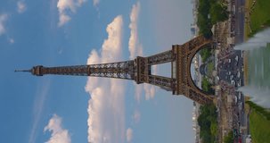Vertical video famous square with Eiffel tower in the background time lapse. Trocadero and Eiffel tower are the most visited attractions of Paris. Hyperlapse. Cumulus clouds in the background