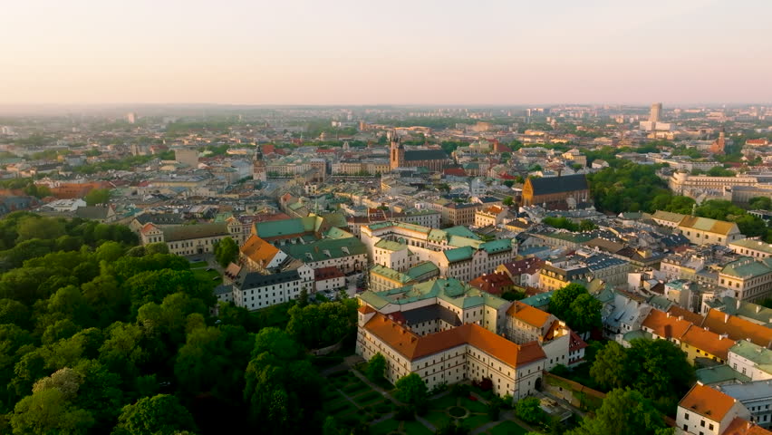 Panorama of Old Town (Main Square, Town Hall, Wawel Castle) in Krakow. Aerial View of Krakow, Poland, Old Town. Main Market Square. Saint Mary’s Basilica in Krakow. Poland.