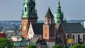 Panorama of Old Town (Main Square, Town Hall, Wawel Castle) in Krakow. Aerial View of Krakow, Poland, Old Town. Main Market Square. Saint Mary’s Basilica in Krakow. Poland.