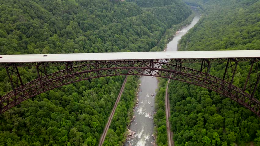 bridge over a gorge and river in New River Gorge National Park and Preserve in West Virginia. Taken from a bird