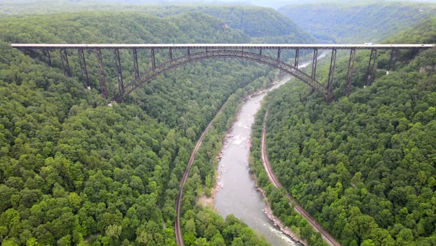 bridge over a gorge and river in New River Gorge National Park and Preserve in West Virginia. Taken from a bird