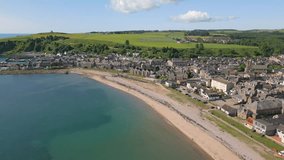 Aerial drone video of the coastline of Stonehaven. Stonehaven is a coastal town in Aberdeenshire, Scotland.