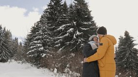 The magical world of snow beauty opens up to a couple in love in this fascinating video. Tender moments of communication between two hearts in the possession of the winter beauty of nature.