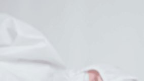 Vertical video. Checkup time. Illness countdown. Healthcare specialist in medical ppe suit hand in blue glove with alarm clock isolated on grey background. - Powered by Shutterstock - Get 15% off with code: PIKWIZARD15