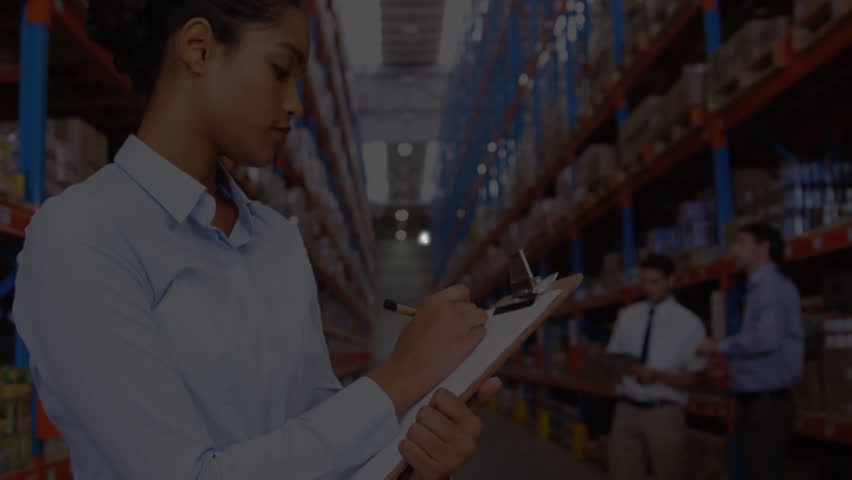 Animation of connected people icons over biracial female manager writing in checklist at warehouse. Digital composite, social media, networking, portrait, confident, shelf, shipping and logistics. - Powered by Shutterstock - Get 15% off with code: PIKWIZARD15