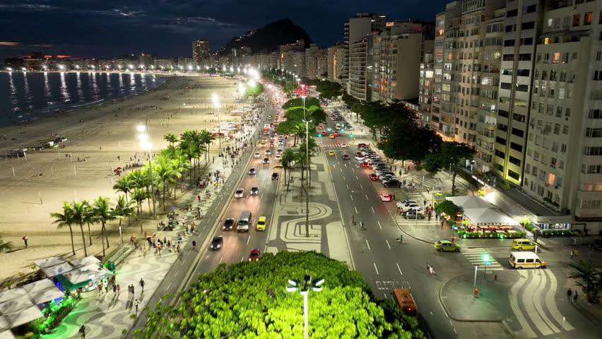 Night Traffic At Copacabana Beach Rio De Janeiro Brazil. Cityscapes Towns And Cities. Town District Urban. Town Outdoor District Downtown Panoramic. Town Urban City Landmark Rio de Janeiro Brazil. Royalty-Free Stock Footage #1105855769