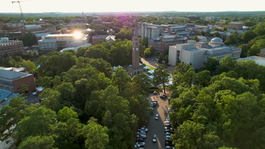 UNC clock tower drone flyover North Carolina Chapel Hill late summer afternoon