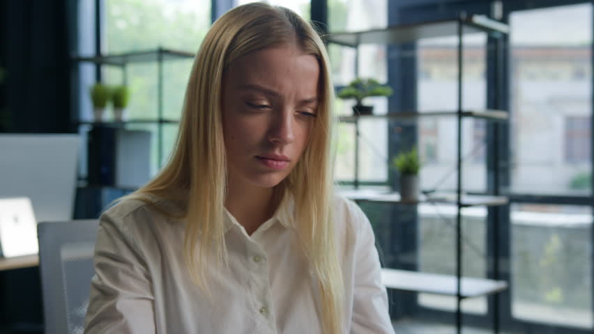 Tired Caucasian woman employer student feel pain eyestrain eyes discomfort after computer online business work in office exhausted overworked businesswoman girl headache pain ache bad vision eyesight Royalty-Free Stock Footage #1105878363