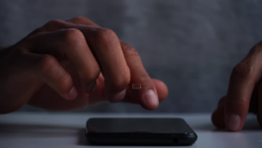 A men using AI smart phone for analyze a stock market exchange. Business data number futuristic hologram background. | Shutterstock HD Video #1105882405