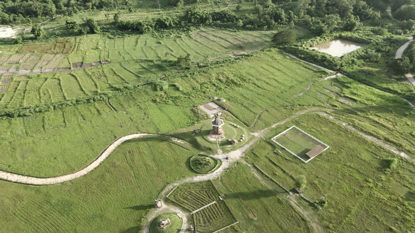 View from the top of a mill in the middle of a green meadow in Huay Tung Tao