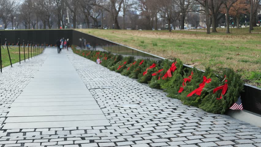 Vietnam Veterans Memorial, Holiday wreaths lay along the wall. Washington, DC.