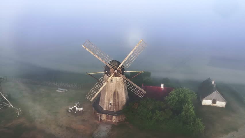 A rare weather phenomenon ringed glory behind Angla windmill in Saaremaa. Estonia. Royalty-Free Stock Footage #1105908419