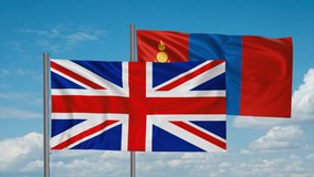 Mongolia and United Kingdom, UK flag waving together in the wind on blue sky, cycle looped video, two country cooperation concept