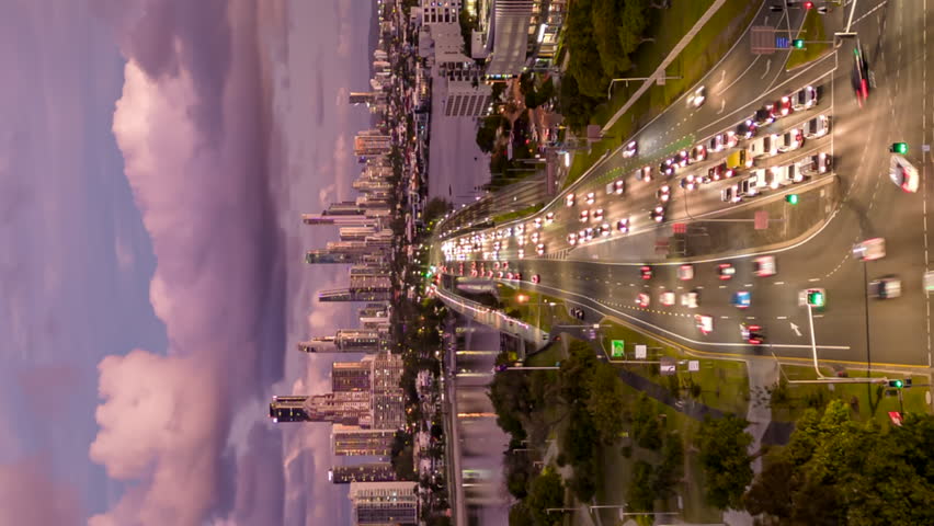 Vertical hyperlapse of colorful sunset above Surfer